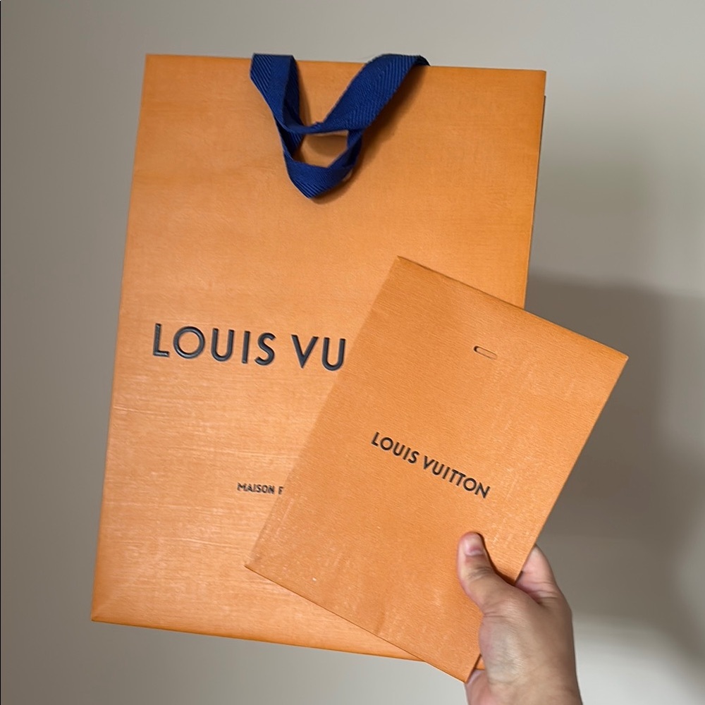 Louis Vuitton Orange Bag with Blue Handles